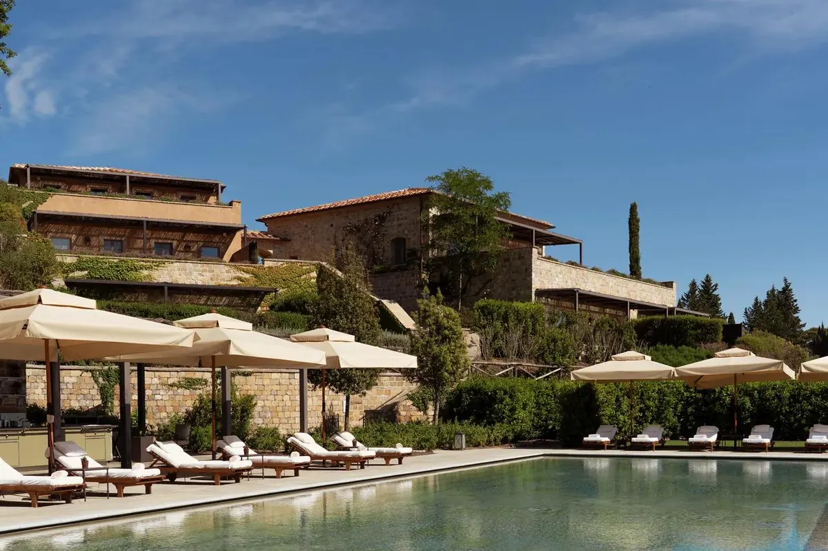 Castiglion del Bosco borgo pool with woodland views