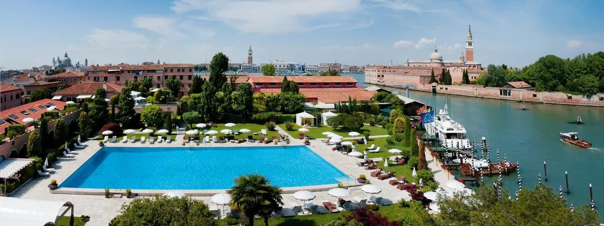 Hotel Cipriani Venice Olympic saltwater pool with Venice skyline and Campanile