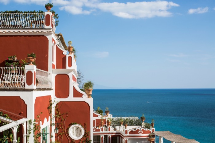 Le Sirenuse iconic red villa exterior with balconies