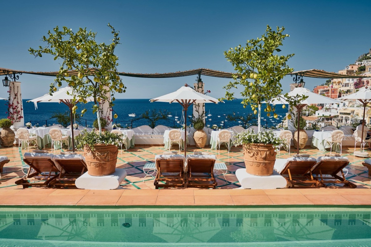 Le Sirenuse rooftop pool terrace with lemon trees and sea view