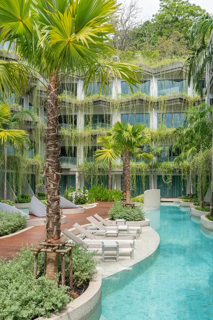 Panwaburi Resort Phuket lagoon pool with tropical gardens and cascading-plant façade